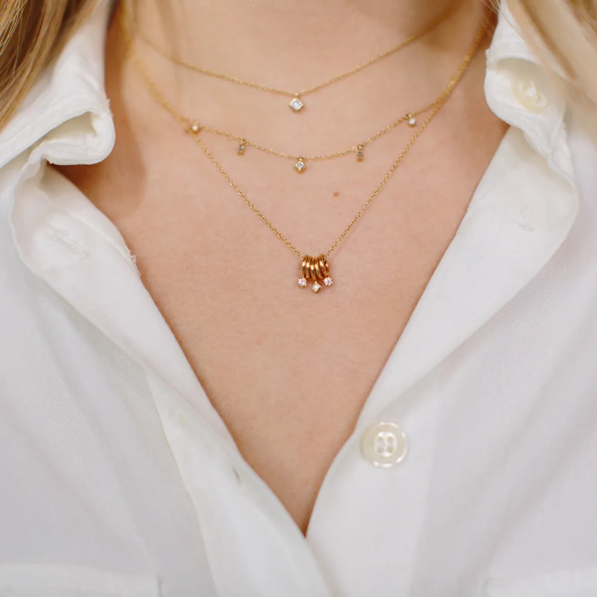 14k 5 Tiny Rings Necklace with Mixed Diamonds