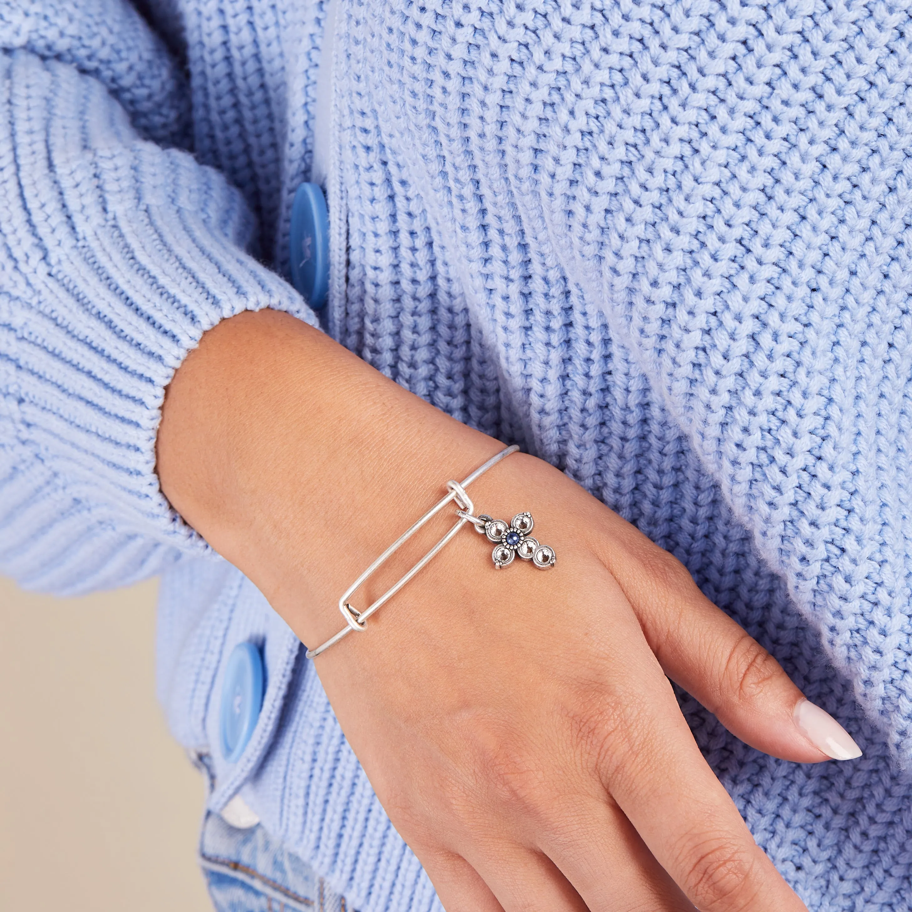 Bangle Bracelet Featuring Cross Charm and Pearl Infusion